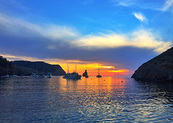 Catch the sunset in Ibiza this summer, go to Es Vedra on the south western tip of the island to the red sky at night