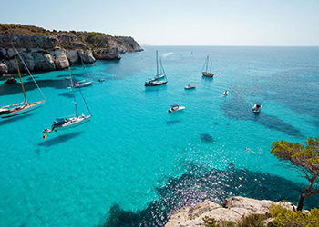 Dive into the blue waters of Formentera from your private charter boat